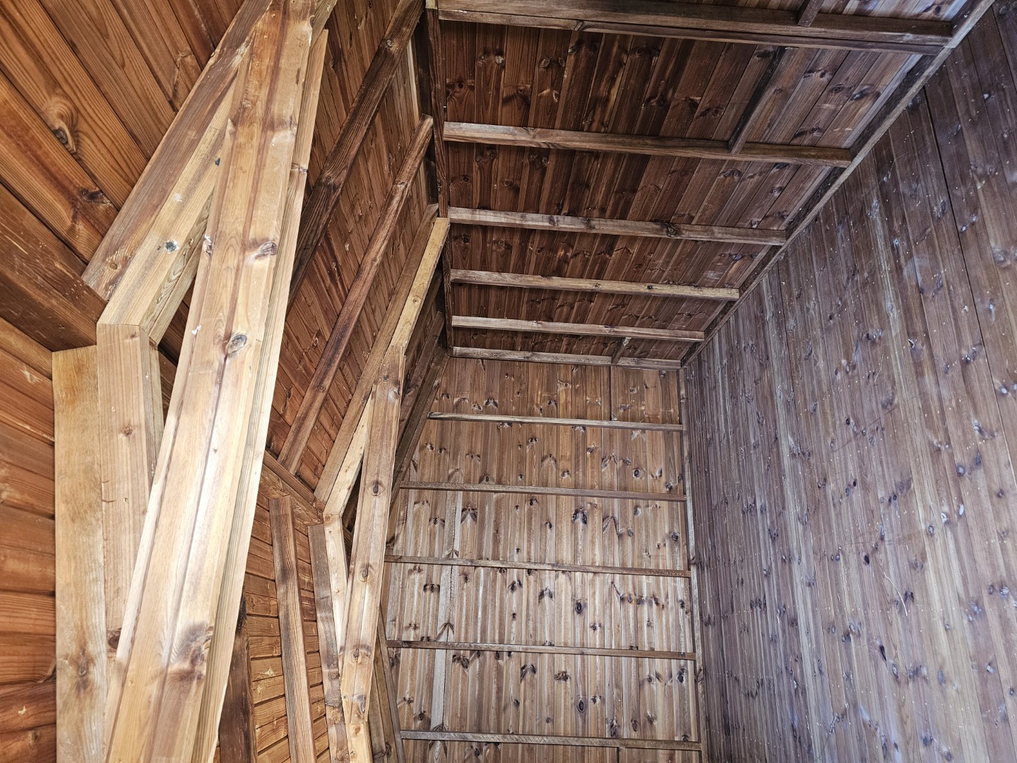 Heavy-duty internal timber framework and roof trusses in a bespoke shed