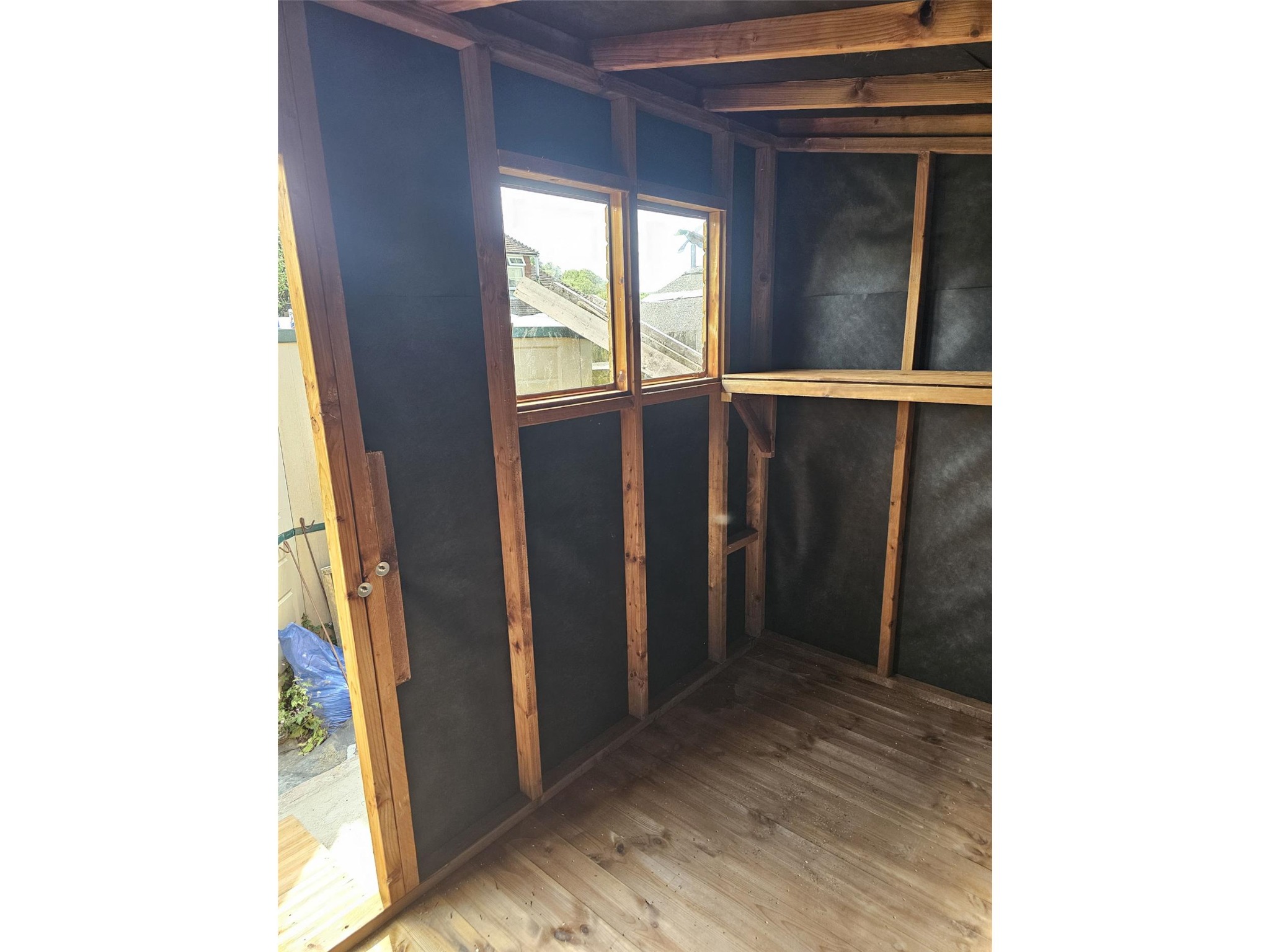 Interior framing and shelving inside the 10x6 Pent B Beast shed