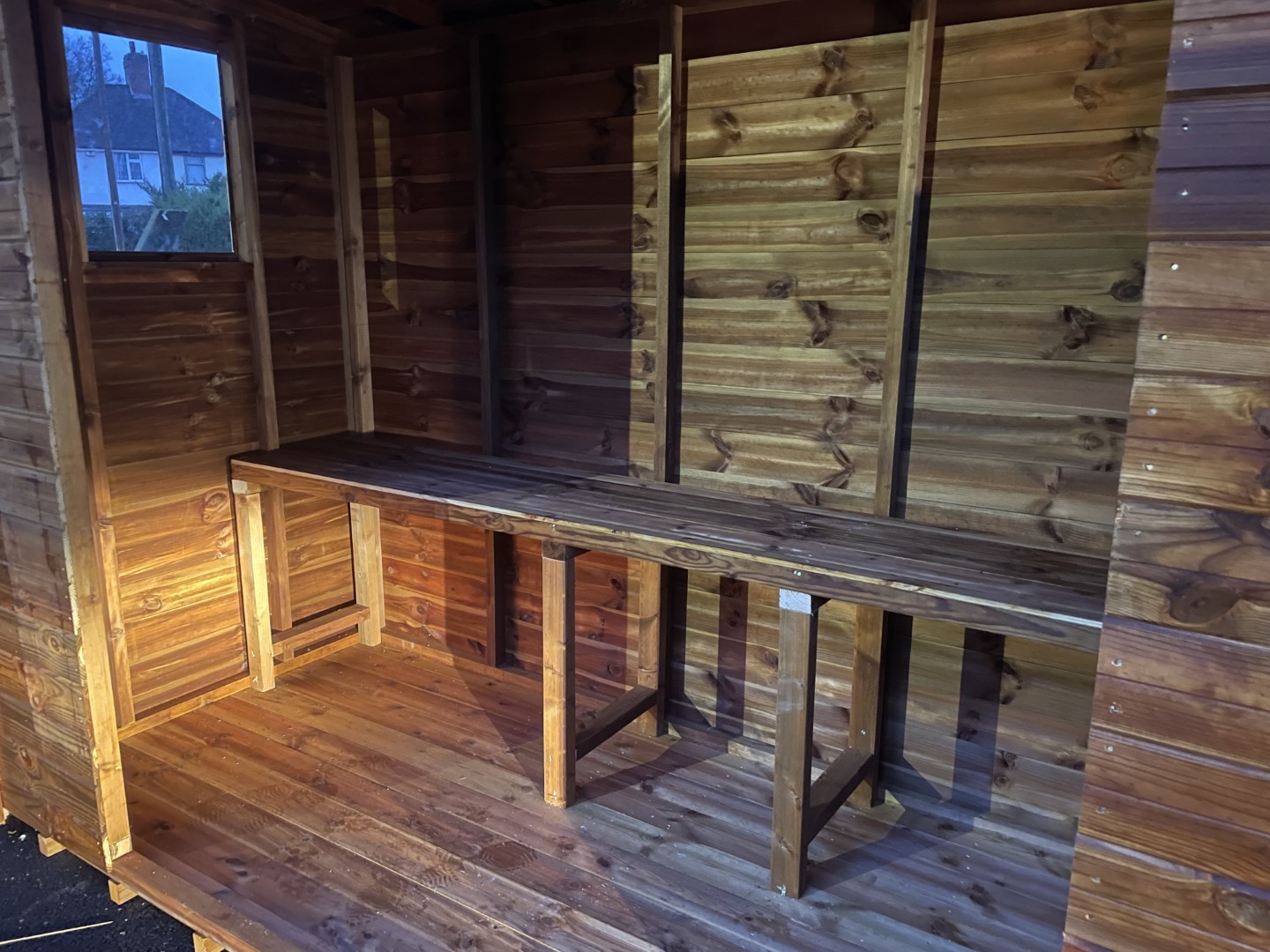 Heavy-duty timber counter inside the Grendon club smoking shelter