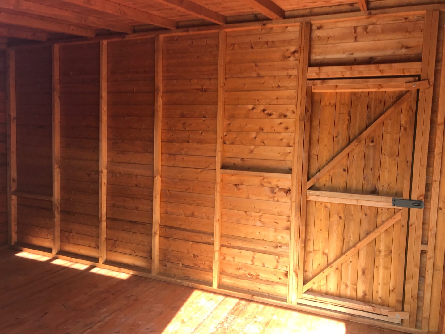 Spacious timber interior of the 14 by 8 Beast shed