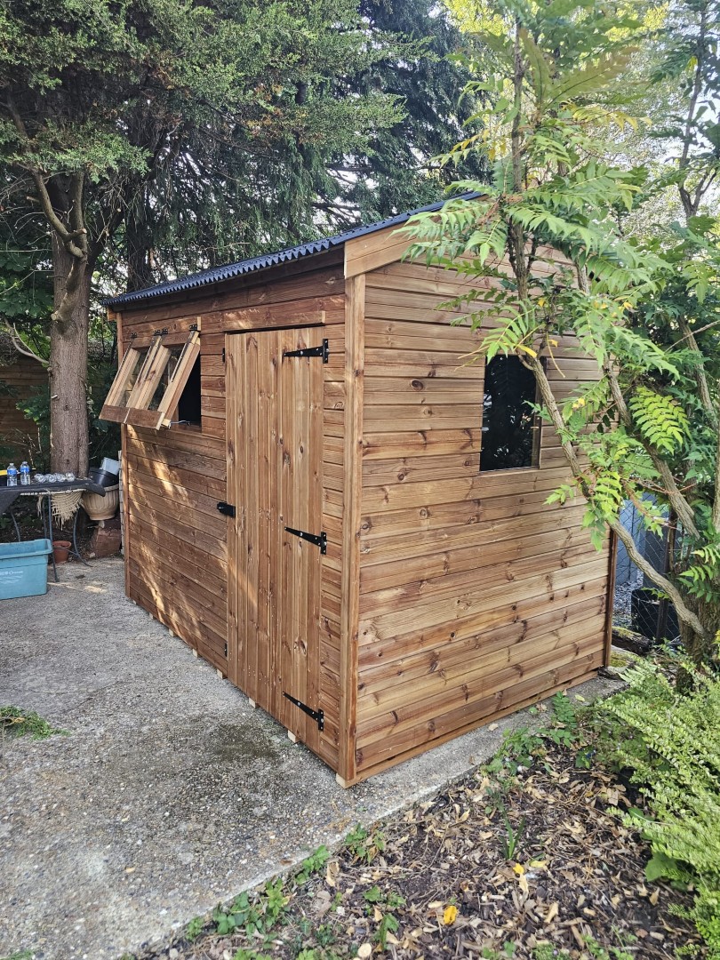 Front view of the Milton Keynes HiPex Tanalised Security shed with opening windows and wide door
