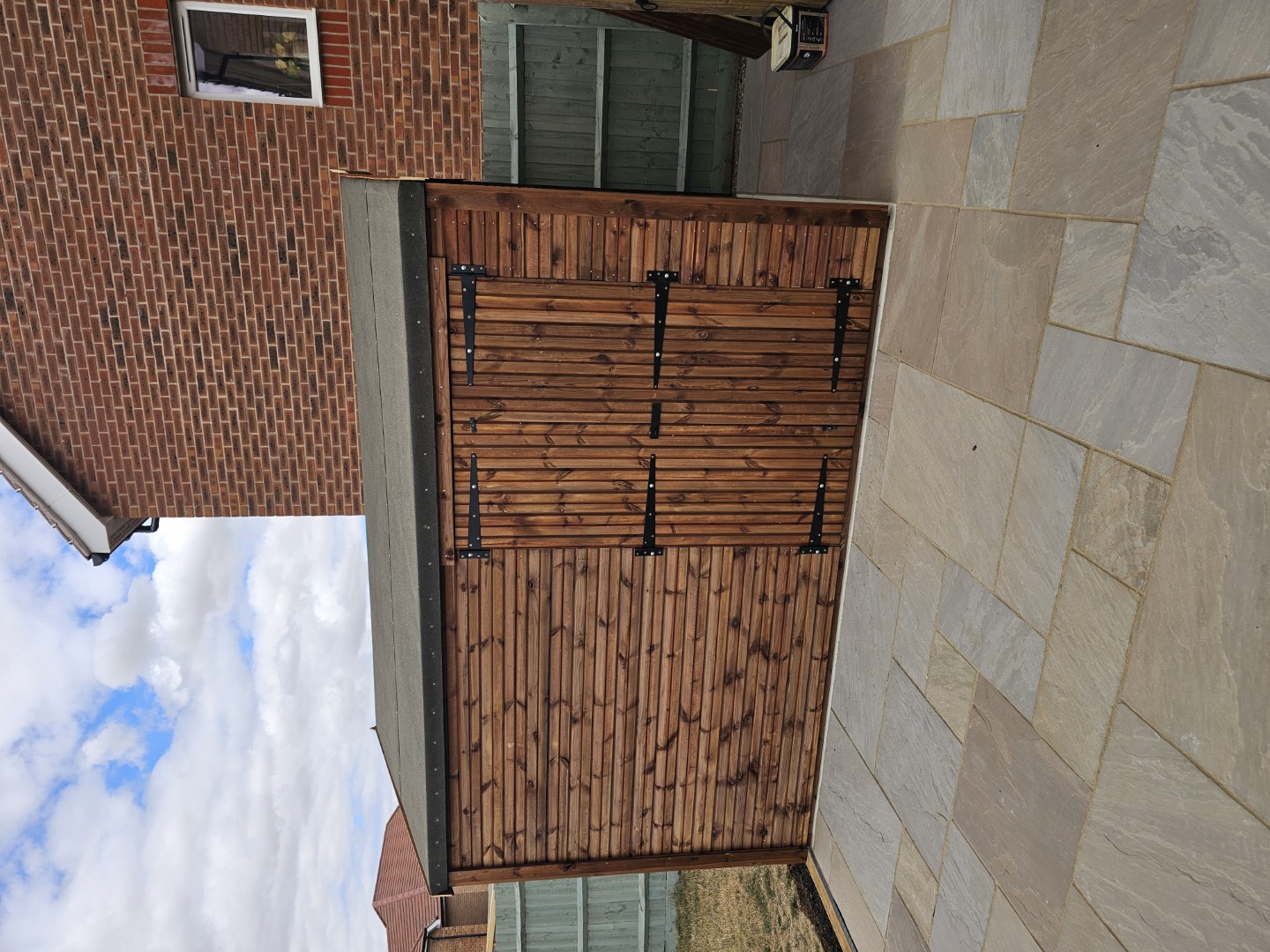 11 by 9 Hipex Beast shed with four foot double doors installed at a new build property in Reading