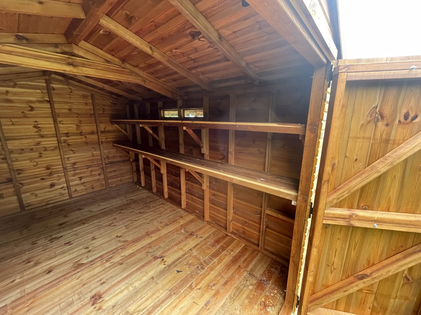 Heavy-duty full length shelving fitted inside the Apex Beast shed