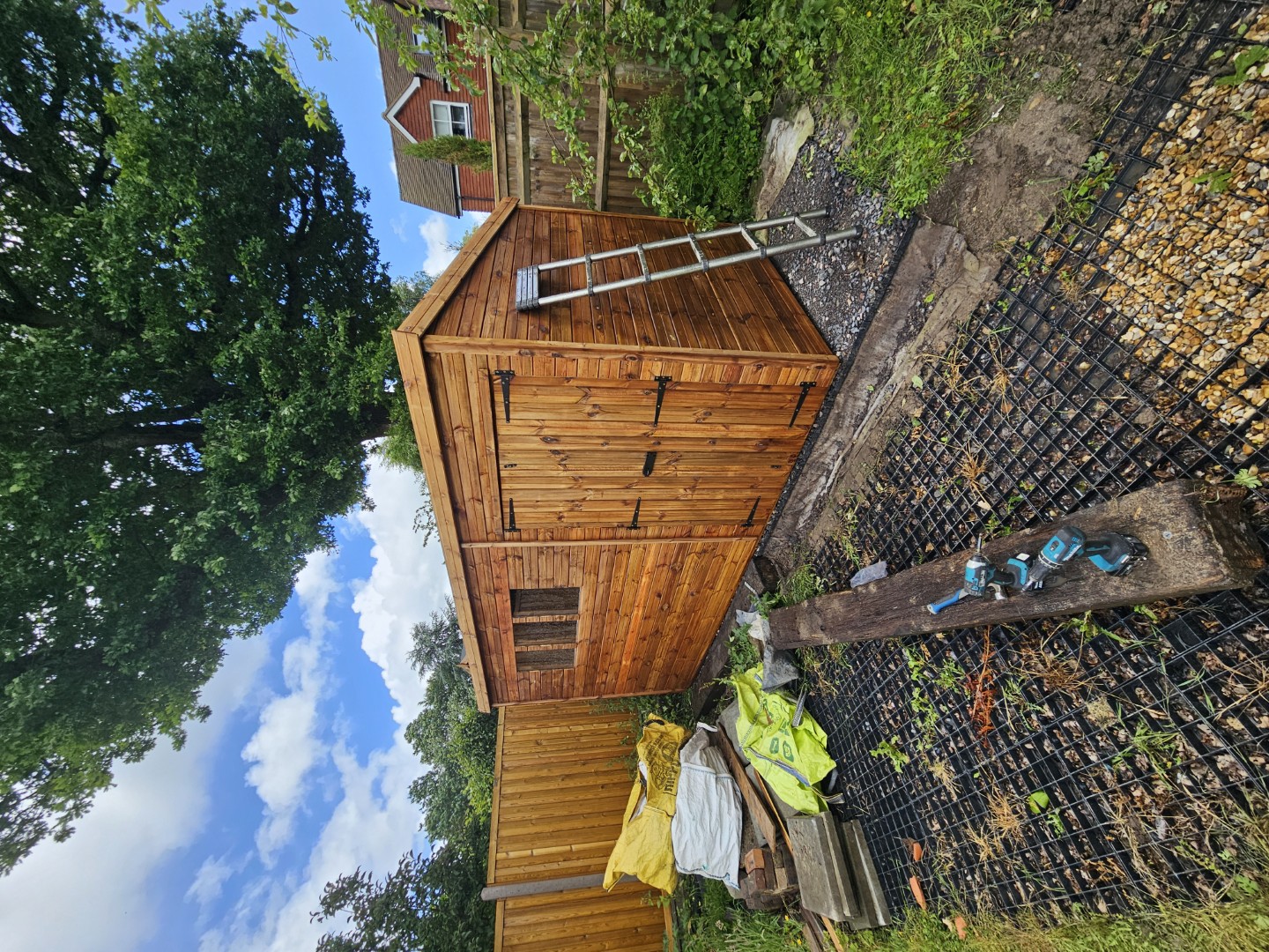 14 by 6 Pent Tanalised shed with four foot double doors installed in a Solihull garden