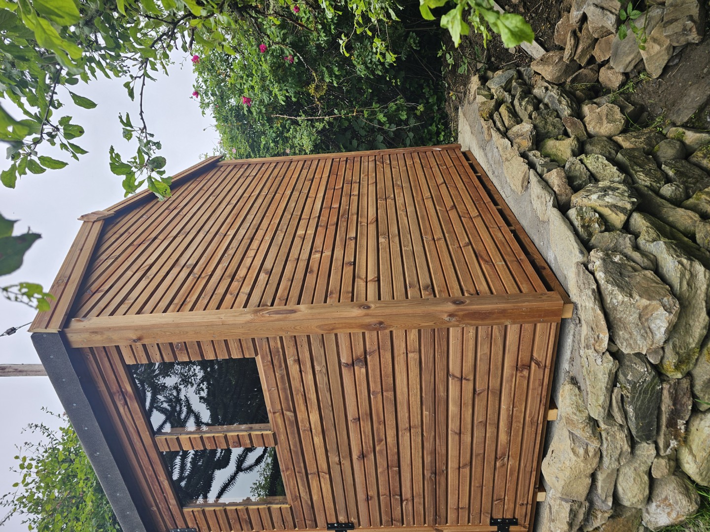 9 by 7 Hipex Beast shed with two windows and four foot double doors installed on a raised platform in Southampton