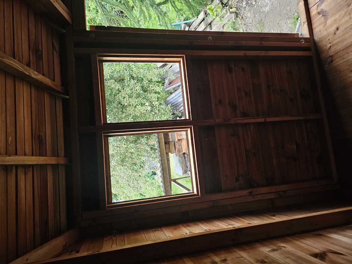 Interior view through the open double doors of the Southampton 9 by 7 Hipex Beast shed