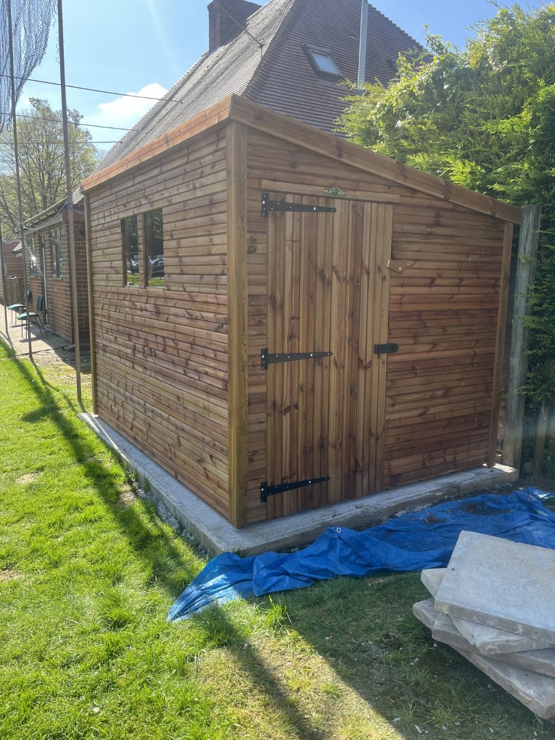Door and front elevation of the Caterham School shed