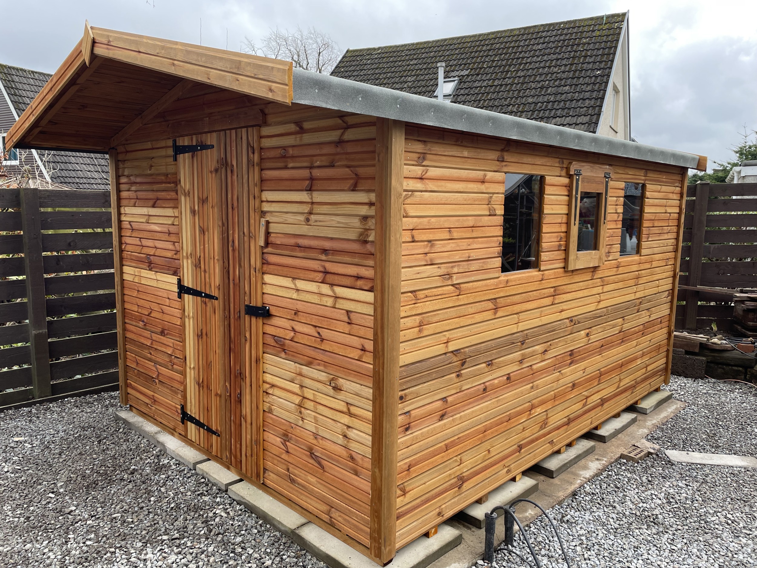 Close view of shed raised on timber bearers