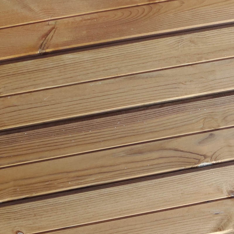 Close-up of Tanalised rebated shiplap cladding