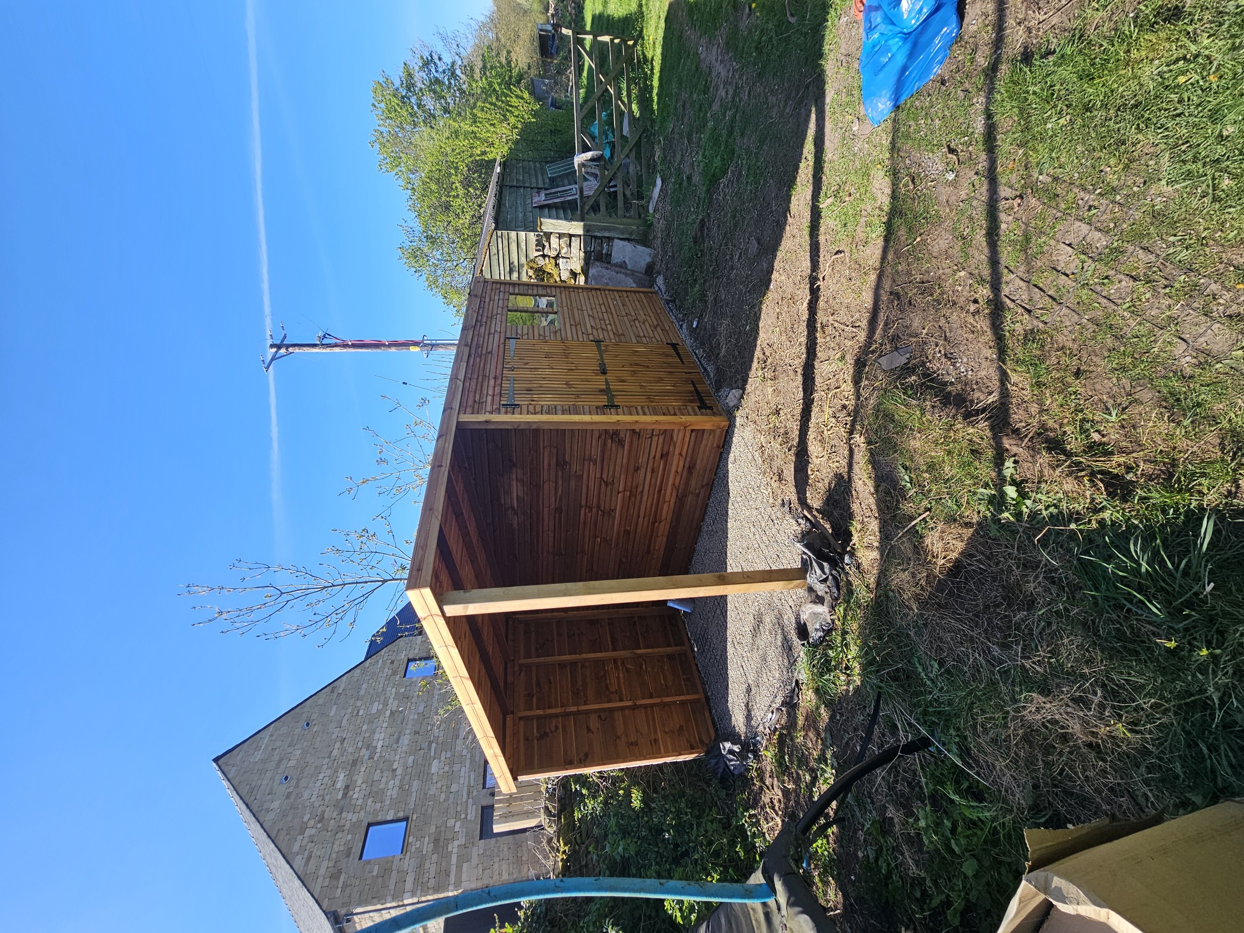 Shed extension with back wall covered