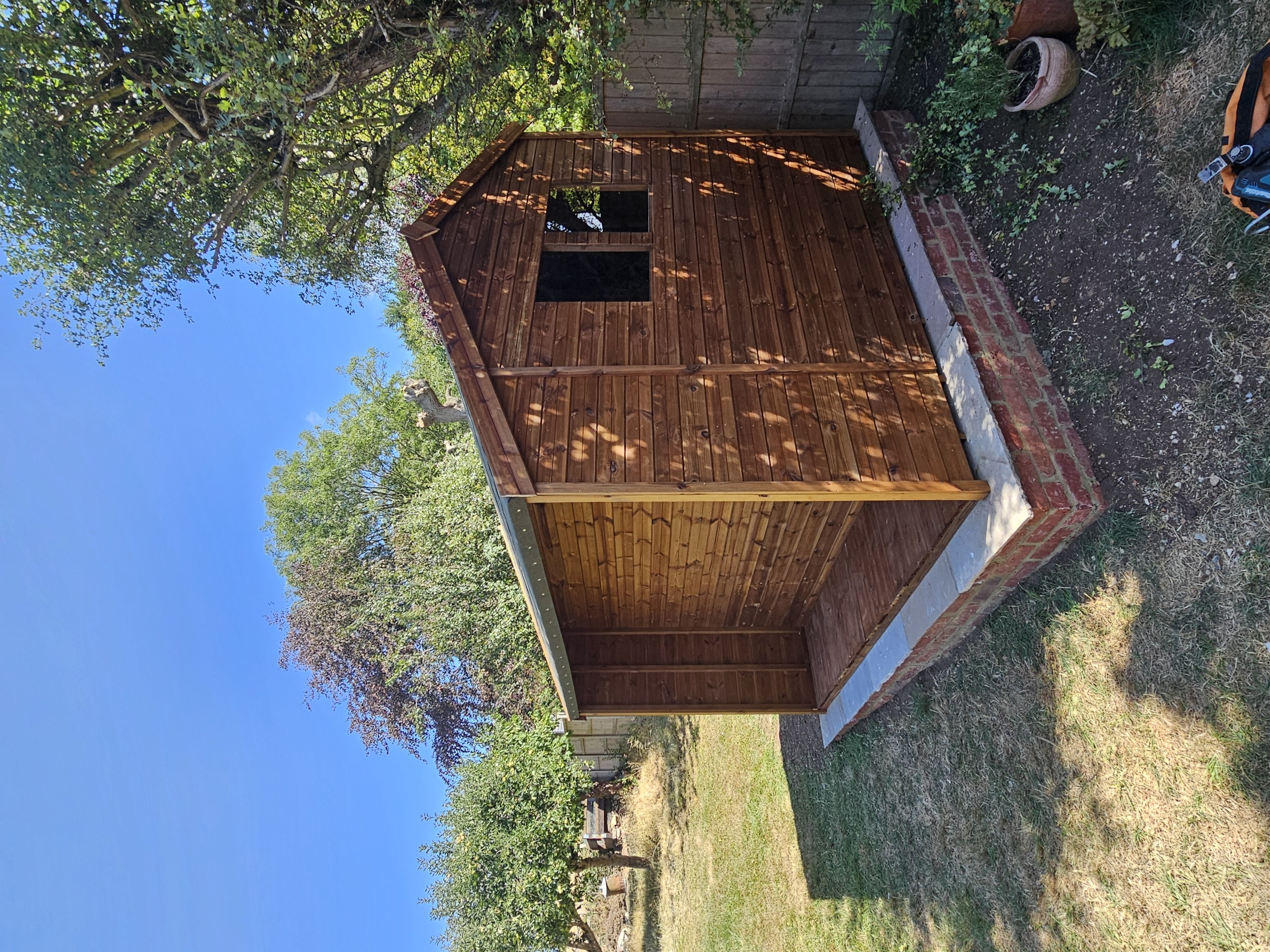 2ft back-and-side-covered extension on a 9x8 shed