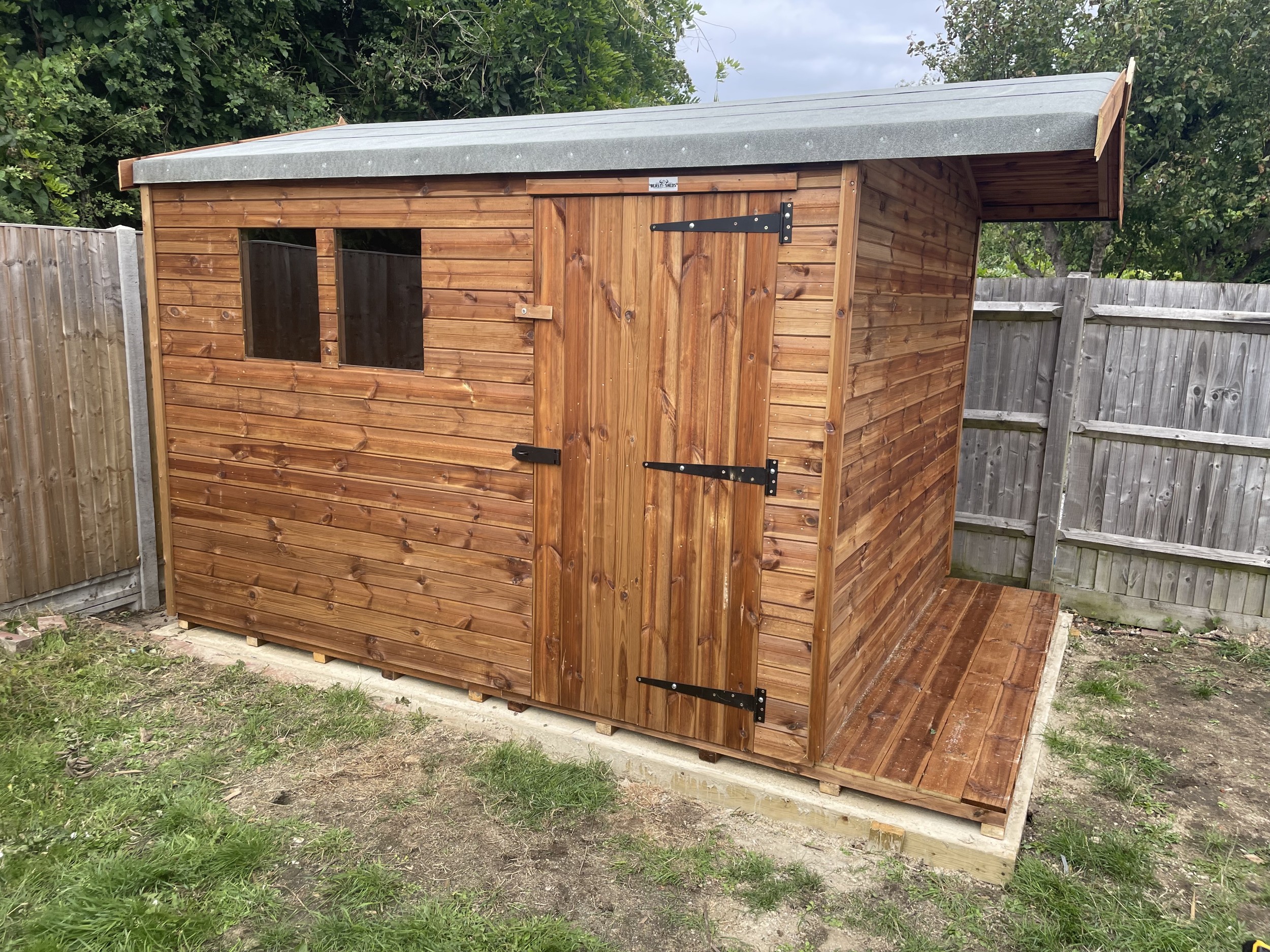 2ft open extension with flooring on a 10x8 shed