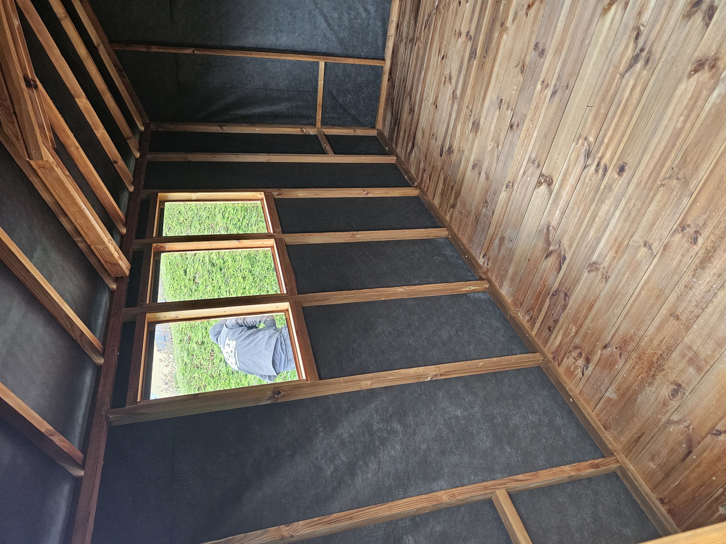 Breathable membrane fitted inside timber shed