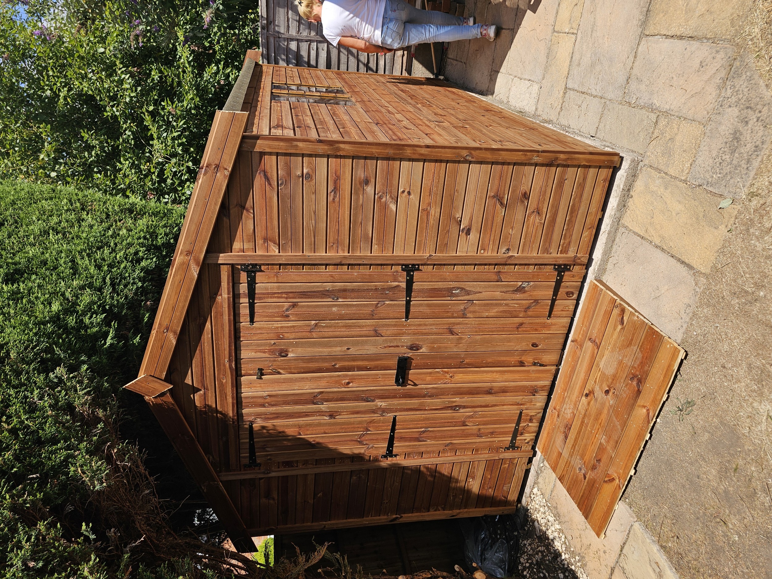 Wide timber ramp leading into shed